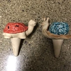 (2) Ceramic Snail/ Turtle Plant Watering Stakes Spikes: Indoor- Outdoor Used. Price: $27.90.